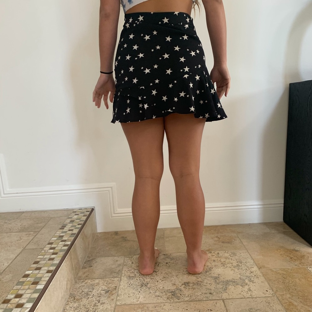 Black mini skirt with stars